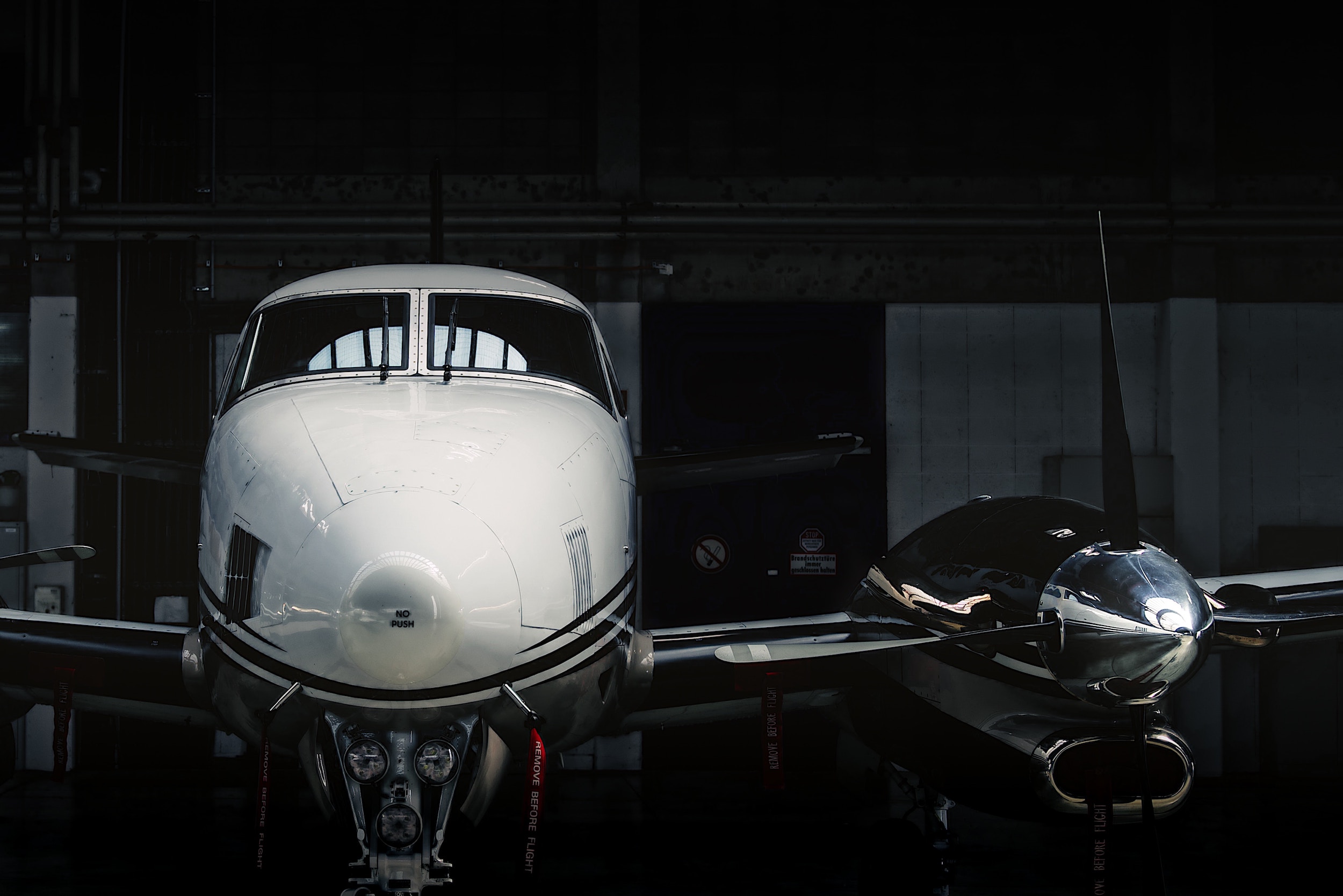 Multi-engine aircraft in flight illustrating twin-engine safety considerations